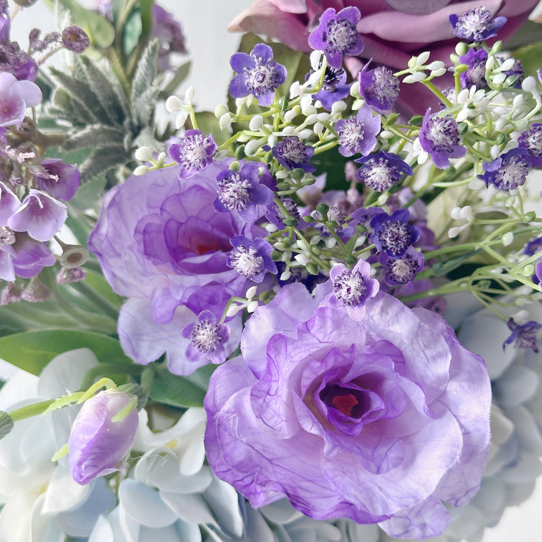 "artificial purple flowers for wedding centerpieces"